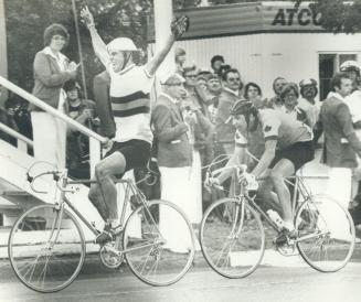 Australia's Philip Anderson his just won the cycling road race for the gold medals and Canada's Pieere Harvey came in second