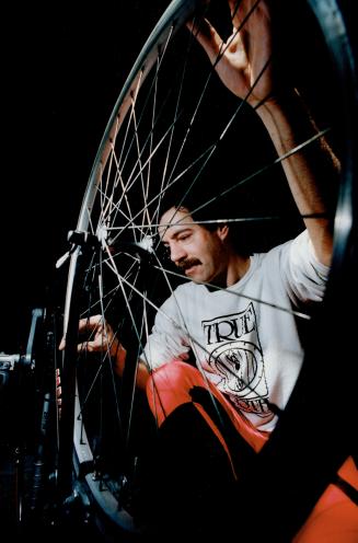 Garry Wice checks out the condition of his bicycle before heading out for his first spring ride