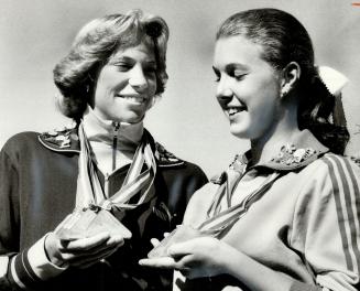 Canada games medals they won in track and field competitions in Newfoundland are displayed by Oakville athletes Janette Wood (left), 17, and Claudia T(...)