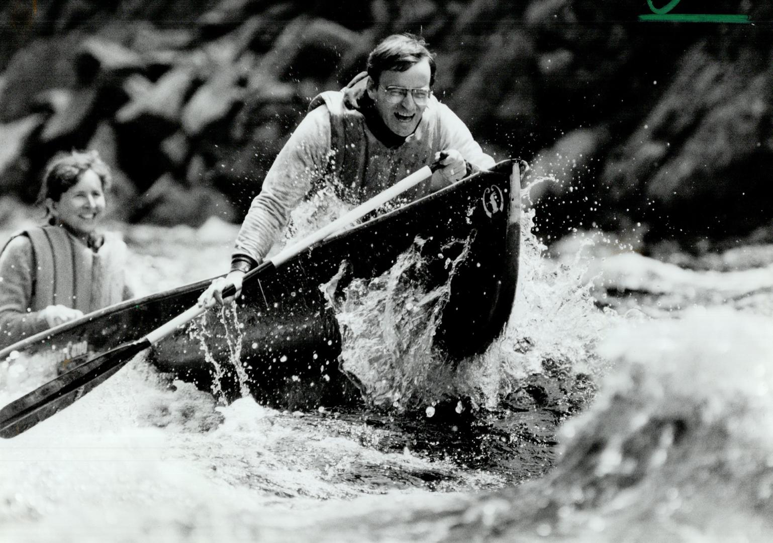 Take a bow: Student paddler Herbert Forrest can't hice his excitement as the bow of his canoe slices through a standing wave