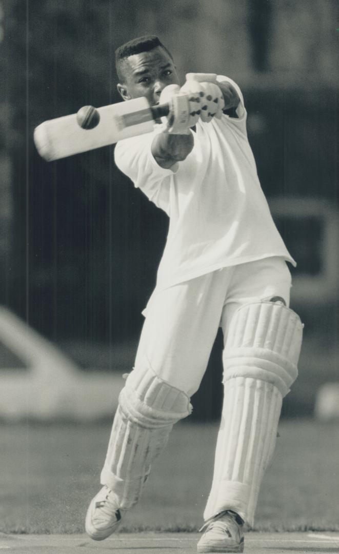 One-man gang. Roger Gordon blasts one of his three sixes during his 65-run knock in a decisive Central Tech cricket win over Parkdale yesterday