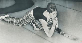 After all-out effort, curler Kathy Bell, of Granite Club, watches the progress of her stone down the ice at the Toronto Cricket Skating and Curling Cl(...)