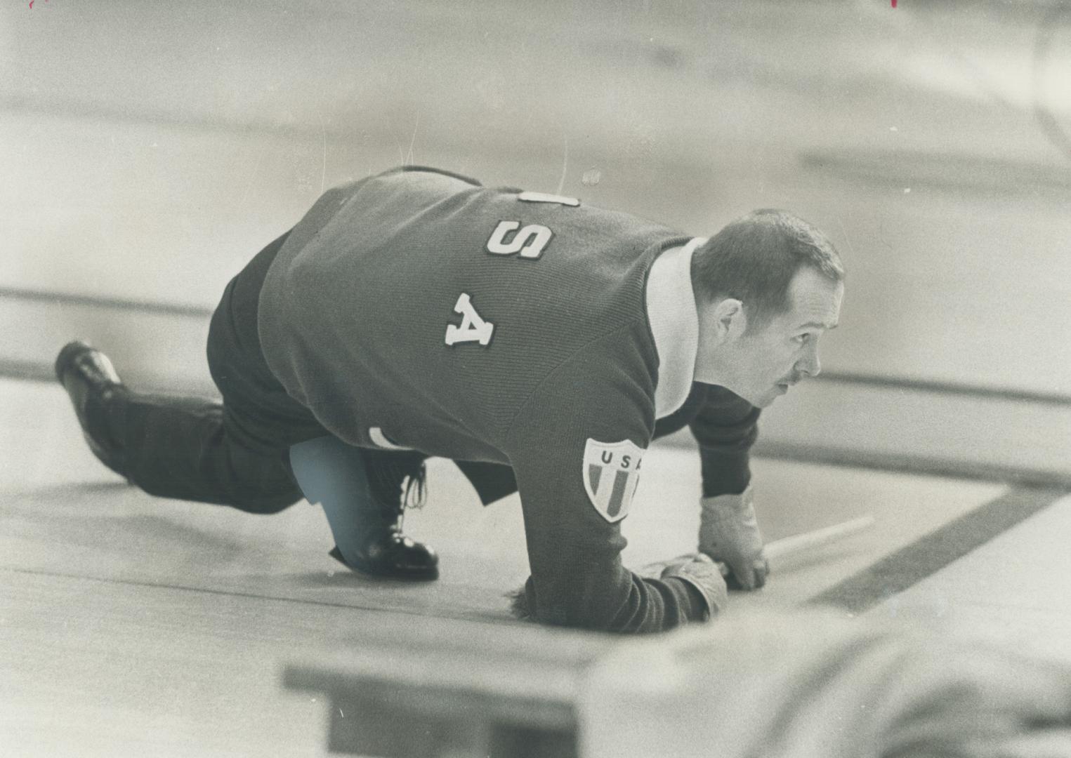 Keeping close watch on rock he has just delivered during play on CBC-TV Curling championships at North York Centennial Centre last night in Bud Somerv(...)