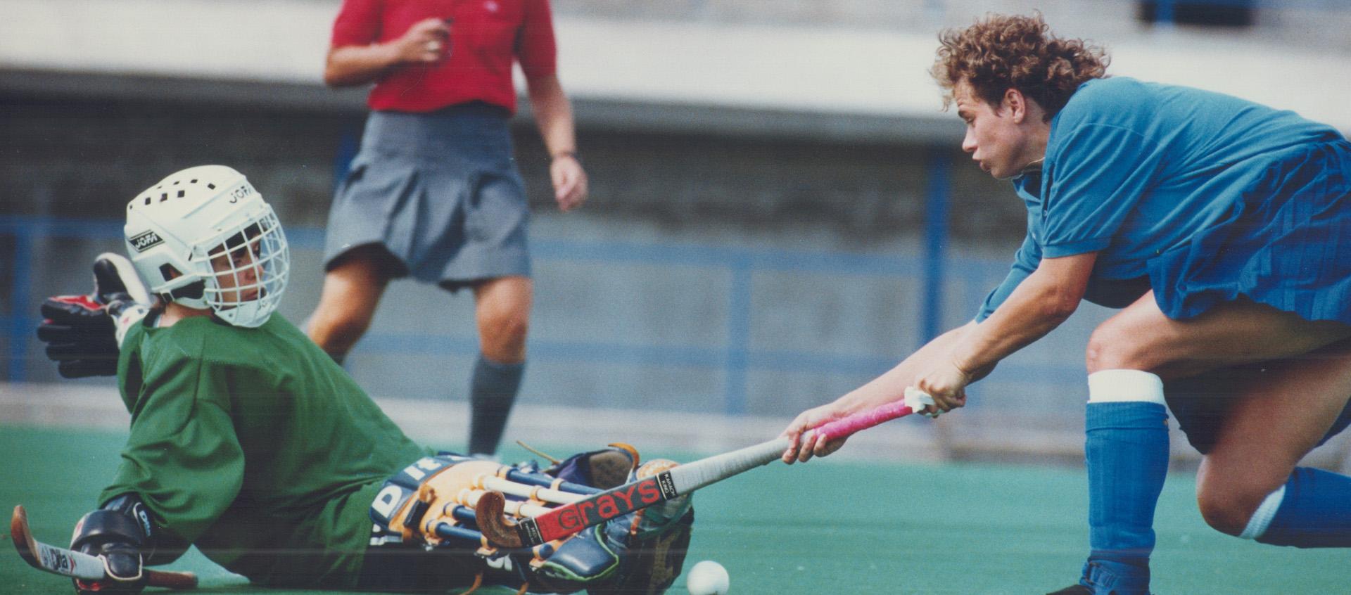 Nova Scotia goalkeeper Debbie Gibson turns aside a shot by British Columbia's Sarah Hill in national field hockey tournament