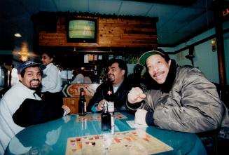 It's cricket: Watching World Cup at Scarborough's Benab West Indian Restaurant, from left, Terry Ramnarine, Prem Ramkissoon, and John