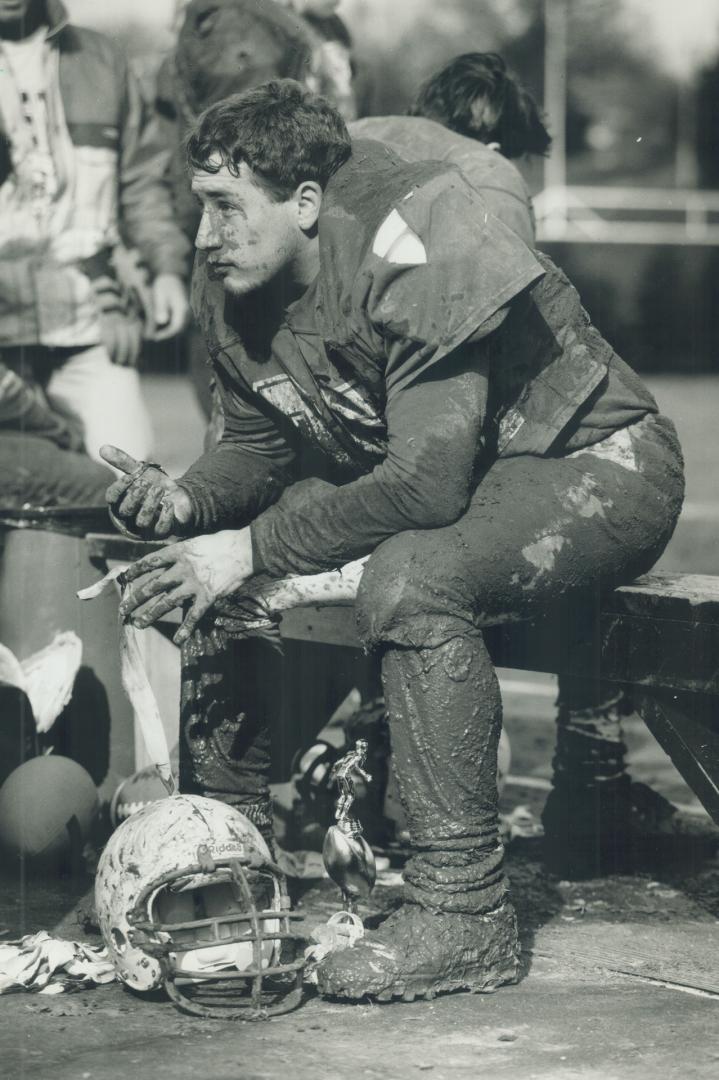 Here's mud in your eye. Crestwood's Peter Simon, the defensive star of yesterday's Metro Bowl quarterfinal, takes a moment to ponder what went wrong i(...)