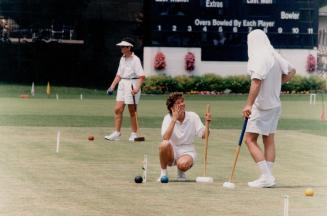 Having a ball: Christine Jones, left, and Don Oakley chat during a break in play at the Canadian Open Croquet Championships at the Toronto Cricket Club