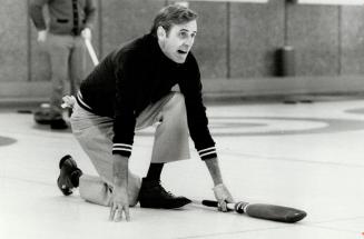 Ron work, the second for John DeGraaf's Humber Highlands rink, watches his shot in Canada Life bonspiel game against the Ken McIntury's Boulevard rink. Humber Highlands won 6-4