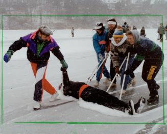 Tony Busoglu takes a laid-back approach to the hijinx at a curling bonspiel on Grenadier Pond yesterday