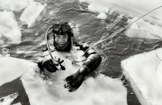 The water's fine! John Doughty, 23, of Thunder Bay, seems to be quite happy about going for a swim in frigid waters