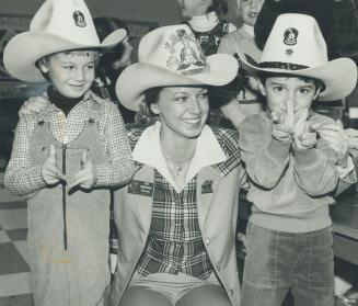 Rootin' tootin' support. This year's Grey Cup champion a anybody's guess (or bet) at this point, but Miss Calgary Stampeder Jodi Merriman - is already(...)