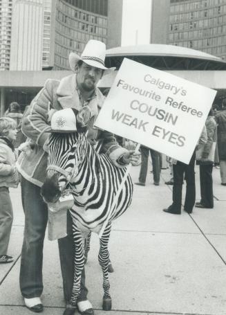 What a ref! cousin Weak Eyes, a 3-year-old zebra, is Calgary's choice as Grey Cup referee