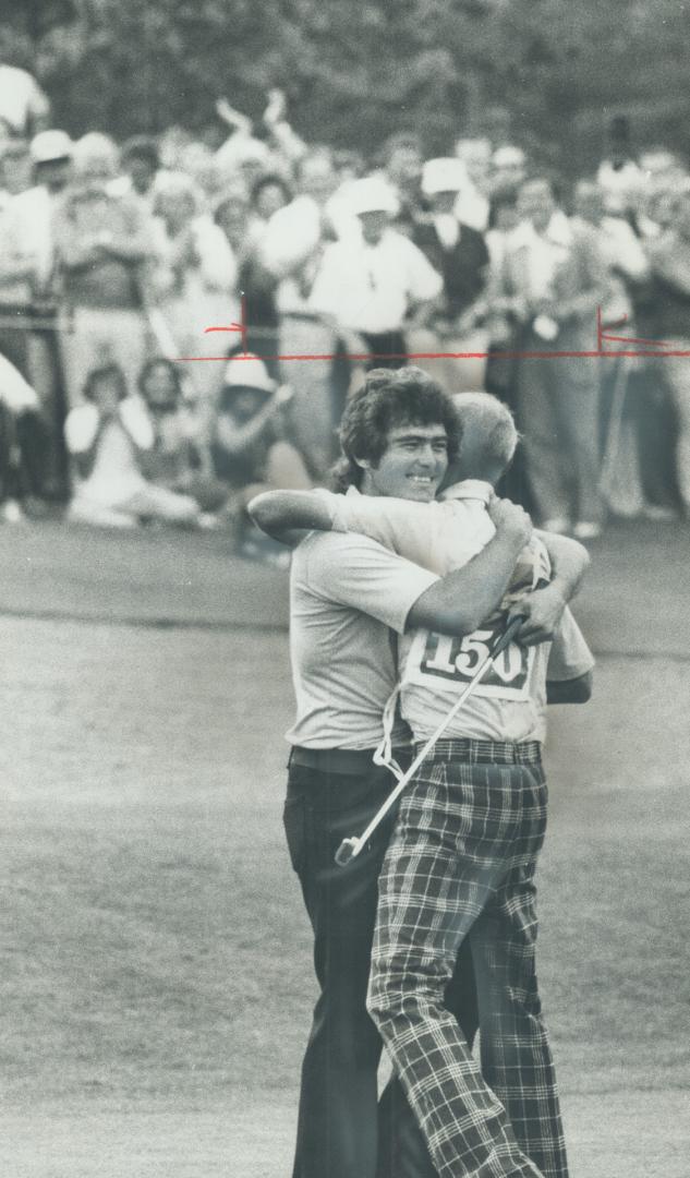 Teamwork: Bill Tape and his caddie, Jimmy Cummings, trade bear-hugs after Tape had cinched the CPGA title yesterday at Bayview Golf Club with a round of 69