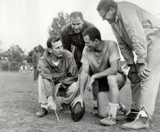 Strategy conference. East York Argos' coaching staff goes into conference before opening match of ORFU season against Oakville at Birchmount Stadium t(...)