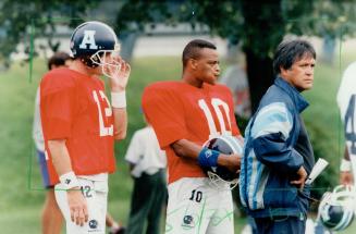 Coach Tommy Lee, Mike Kerrigan (2) and Reggie Slack (10)