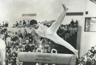 York University gymnast Dave Steeper shows his form on the sidehorse in meet against Penn State