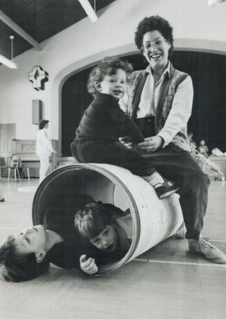 Tumbling Tots, Wendy Bornstein and son Jeffrey watch Anthony (left) and Justin Ivaskiv play at the kindergym class at Holy Trinity Church in Thornhill. To register, call 226-5266