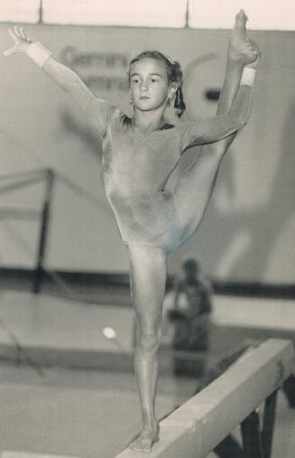 Petite powerhouse: Stephanie Cappuccitti, 8, of Oshawa's Gemini Gymnastics Club, one of the largest in Southern Ontario, works on the balance beam