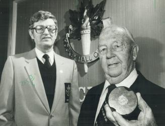 Puck donor: George Fletcher, 79, who was given the puck by Jimmy Main many years ago, donated the cup-winning puck to Hockey Hall of Fame to share space with Barilko's skates