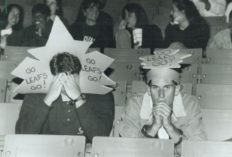 Blue funk at skydome: Rob Woolstencroft, left, and Jay Wilgar of Kitchener register shock at watching Leafs' loss on the JumboTron