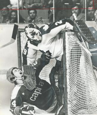 Despite look of agony, Caps' Robert Picard wasn't hurt when he slid past Mike Palmateer into Leaf net