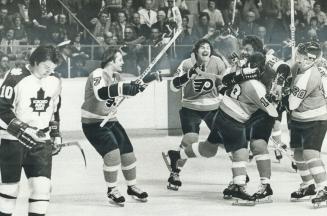 The Victors and vanquished, Two pictures by Star photographer Doug Griffin tell it all in last night's Stanley Cup playoff game at Gardens as jubilant(...)