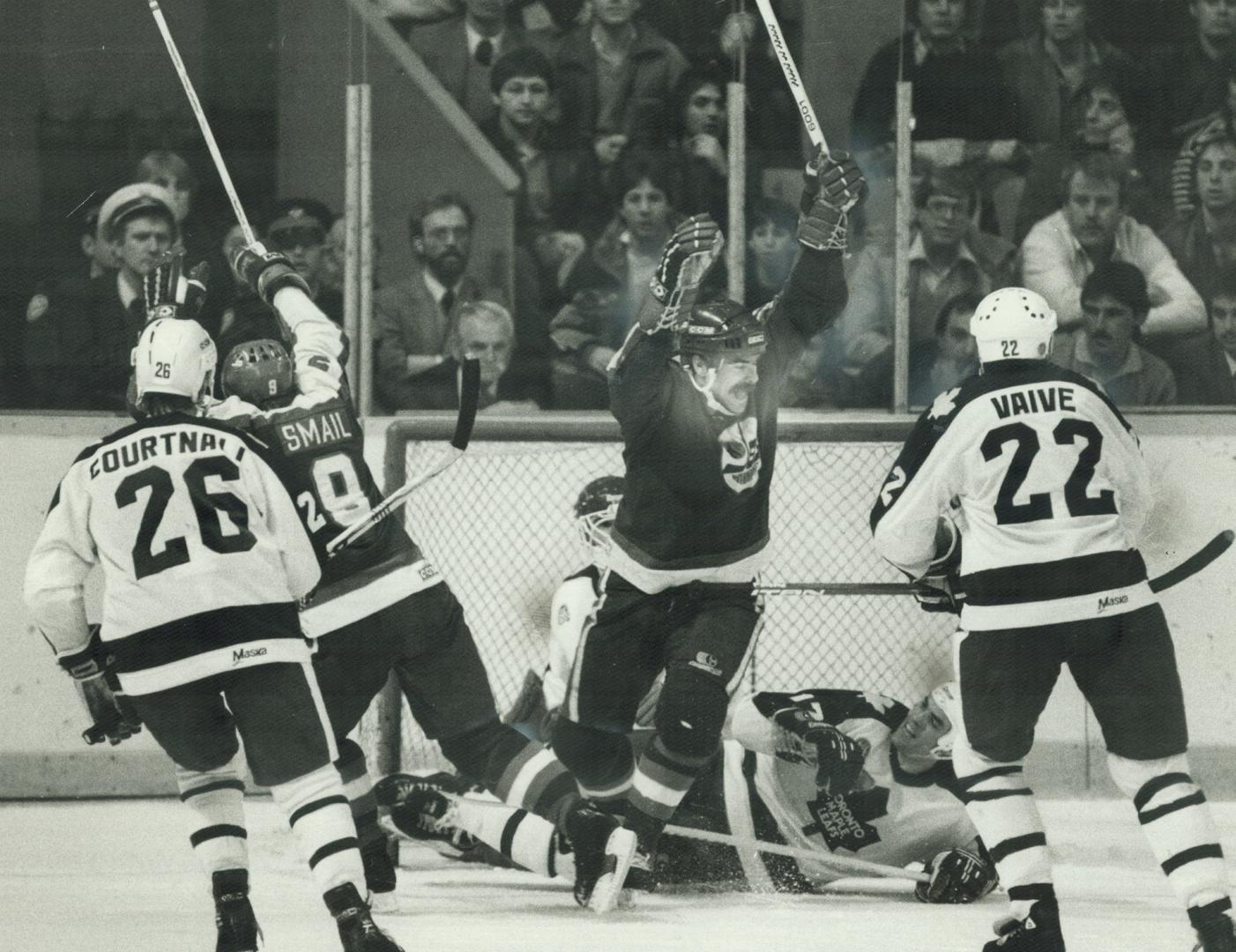 Leafs get no kicks from MacLean, The Leafs argued that the puck was kicked in on this overtime goal, credited to Paul MacLean, centre. Doug Small, lef(...)