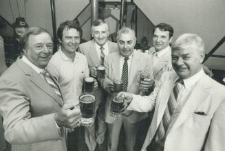 To the good times. Members of Whitby Dunlops 1958 world hockey champions gathered at Ontario Place yesterday to toast the 25th anniversary of their wi(...)