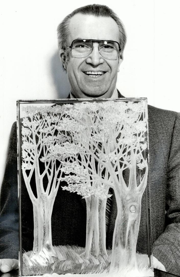 Crystal beauty: Joe Markovic, who hopes to open a gallery in North York to display his glass-art collection, displays a piece called The Forest, which weighs 80 pounds