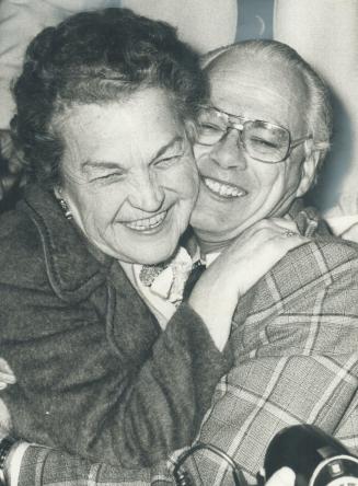 Mississauga's new mayor, Hazel McCallion gets hug from her husband, Sam