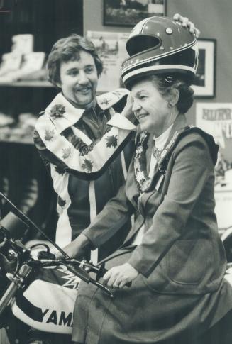 Motorcycle mayor. Hazel McCallion, Mississauga's mayor, tries out motorcycle of stunt rider Laryr McLean, also of Mississauga, at motorcycle show at I(...)