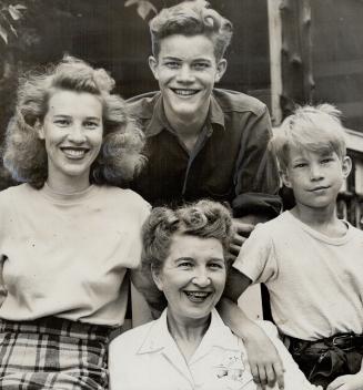 Enjoying vacation are Mrs. Florence Whiting, sister, Mrs. Hooker, Keith, a brother, and David, youngest in the family. First movie for Lois is Mary Hagen with Shirley Temple