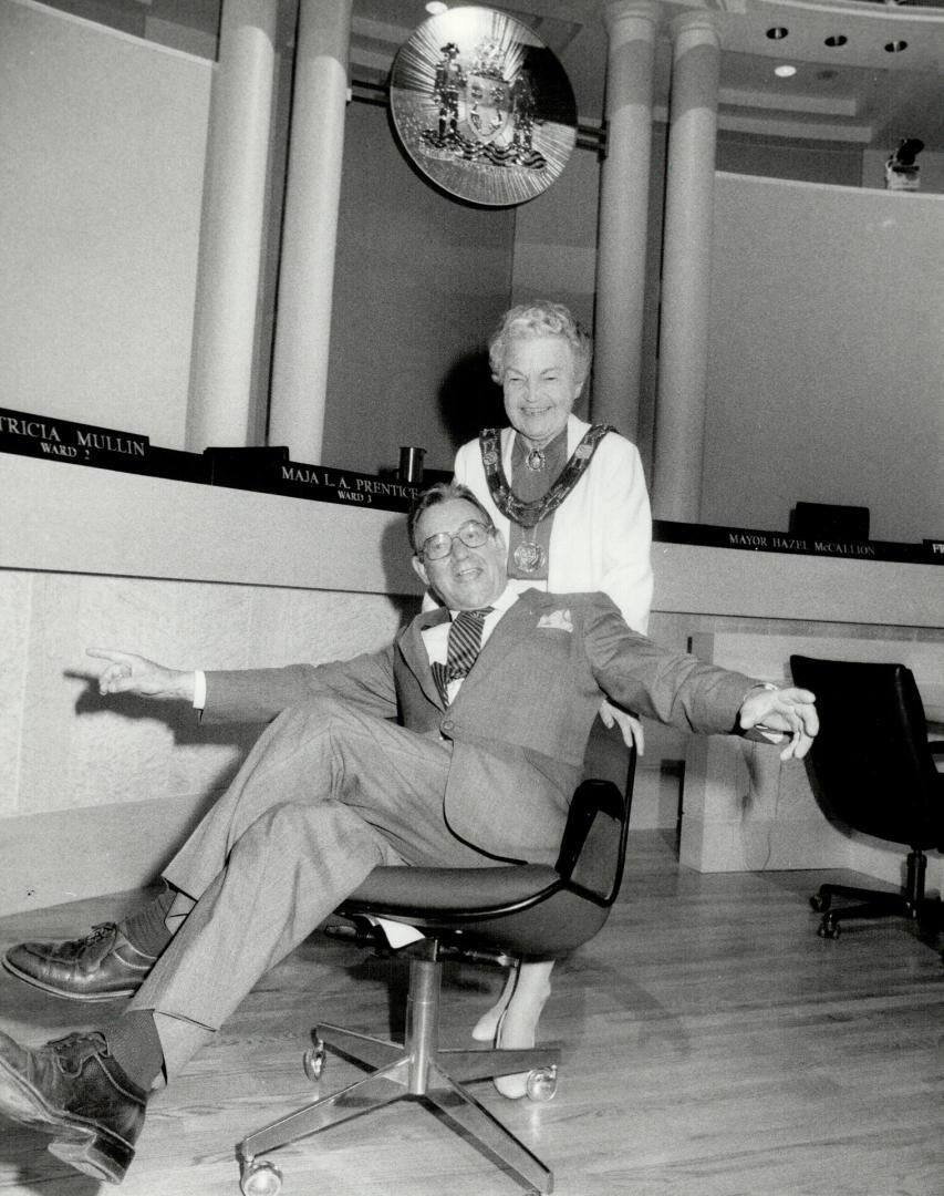 Seat of power. In the new Mississauga council chamber, Mayor Hazel McCallion gives Rotary Club president Malcolm Carey a spin in her old chair, which (...)