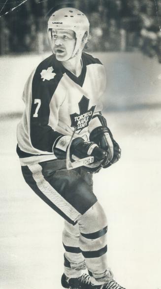 Leaf superstar right winger Lanny McDonald on puck patrol