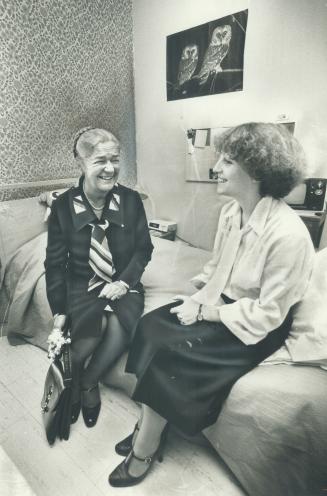 Proud to be chosen as guide for an important visitor, Lina Sorbara, 16, right, shows Lieutenant-Governor Pauline McGibbon her bedroom in Humewood Hous(...)