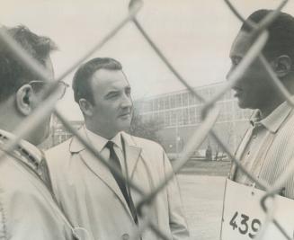 Dennis McDermott talks with Massey picketers