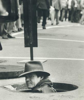 The original script for next year's CBC Canada Day TV special called for Toronto's popular singer or songwriter Murray McLauchlan to roll along Bay St(...)