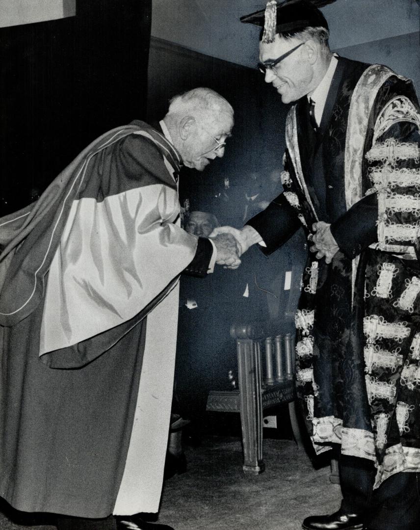 One of four persons to receive honorary Doctor of Laws degrees of the University of Toronto last night, Col