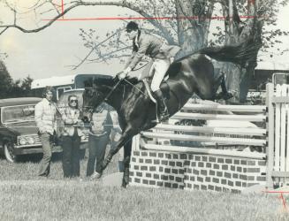 Ian Millar guides Brother Sam over fence en route to a clean run during the Bolton Horse Show yesterday