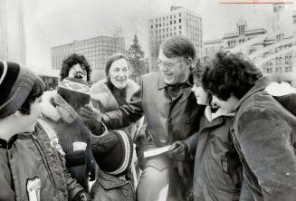 Kids crowded around Howie Meeker when he sited the outdoor rink at Nathan Phillips Square recently