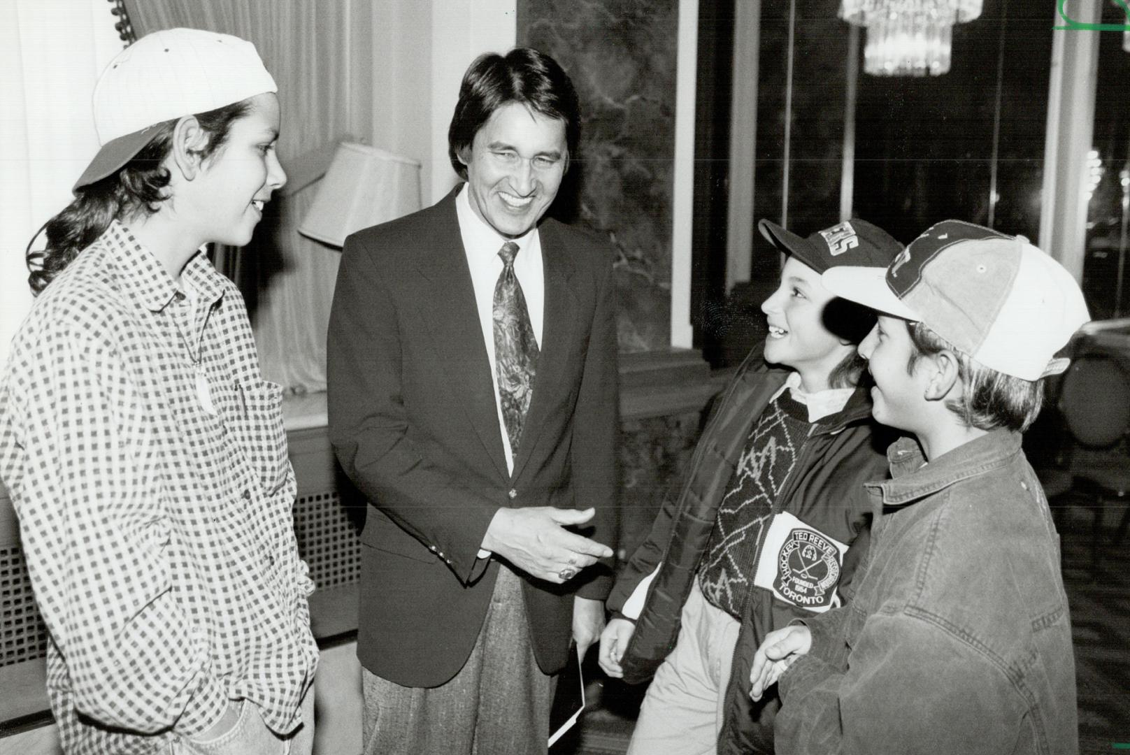 Ovide Mercredl, national chief of the Assembly of first Nations, greets Heeshenn Roy, 11, and Yoti McKay, 10, of Toronto's First Nations School before(...)