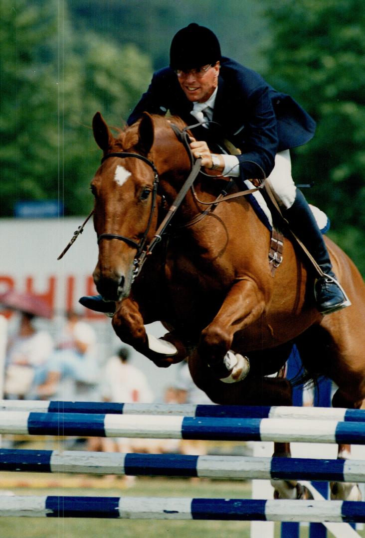 Not bound for glory. Ian Miller urges on Bound For Glory in the Loblaws Classic Open 1 show jumping competition at Sunnybrook Park yesterday, They fin(...)