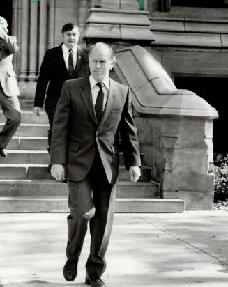 Industry Minister Frank Miller walks to his press conference at Queen's Park today to announce he is in the running for the Ontario Progressive Conservative leadership