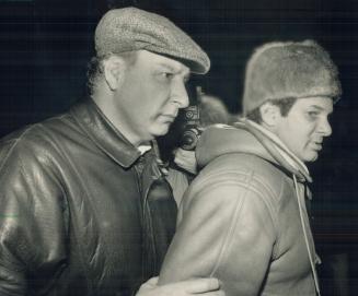 Convicted Palestinian terrorist Mahmoud Mohammad Issa Mohammad, left, leaves office of lawyer Clayton Ruby, right, last night. Mohammad, 46, was to ap(...)