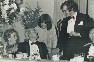 Sculptor Henry Moore talks with his daughter Miss Mary Moore at a dinner given last night to honor the British artist who has donated $10 million wort(...)