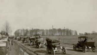 A common scene in front of Jack Miners bird sanctuary with autos for a mile parked along side the road