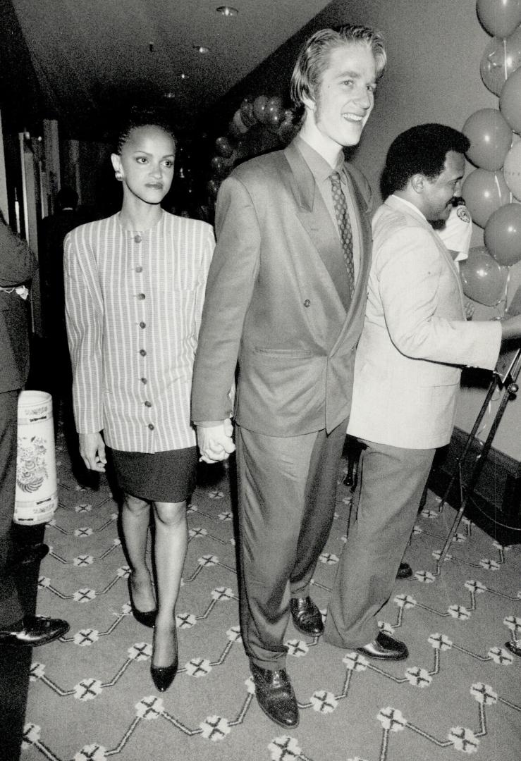 below, Orphans star Matthew Modine arrives with wife Cari, who sports a Giorgio Armani suit