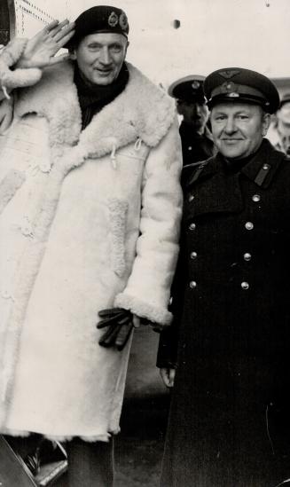 Open-armed hospitality greets the British chief-of-staff, Lord Montgomery, seen with Col