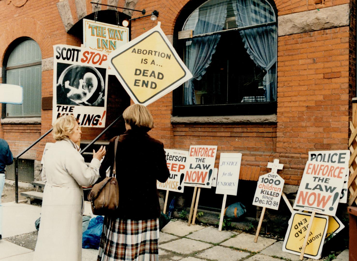 Abortion protest: A handful of pro-life demonstrators picket outside Dr. Henry Morgentaler's Harbord St. abortion clinic yesterday, after the Ontario (...)