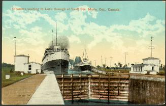 Two steam lakers wait for the water to lower. Picture taken from the lower end, with locks clea…